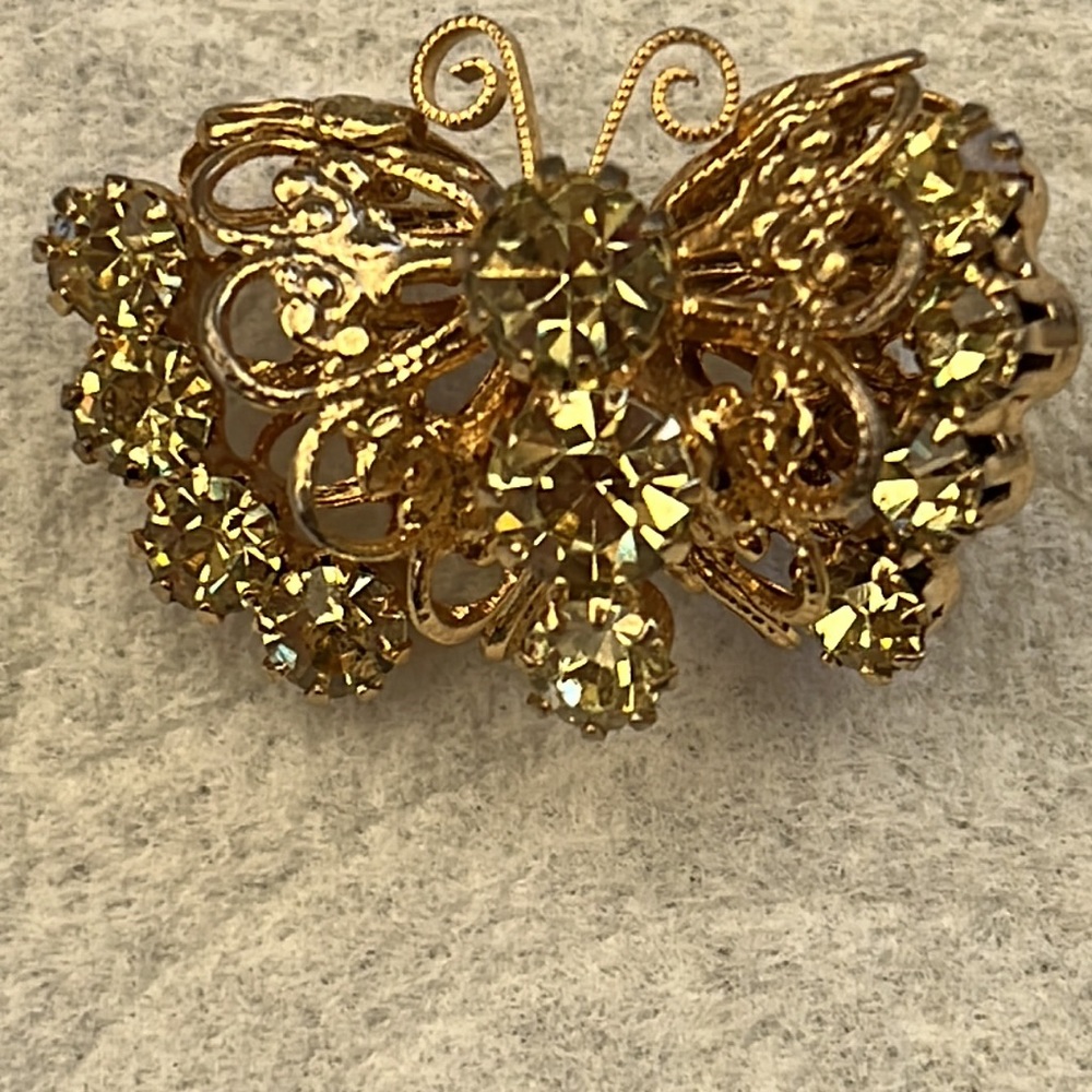 Vintage Butterfly Brooch with beautiful Filigree and Light Peridot stones.